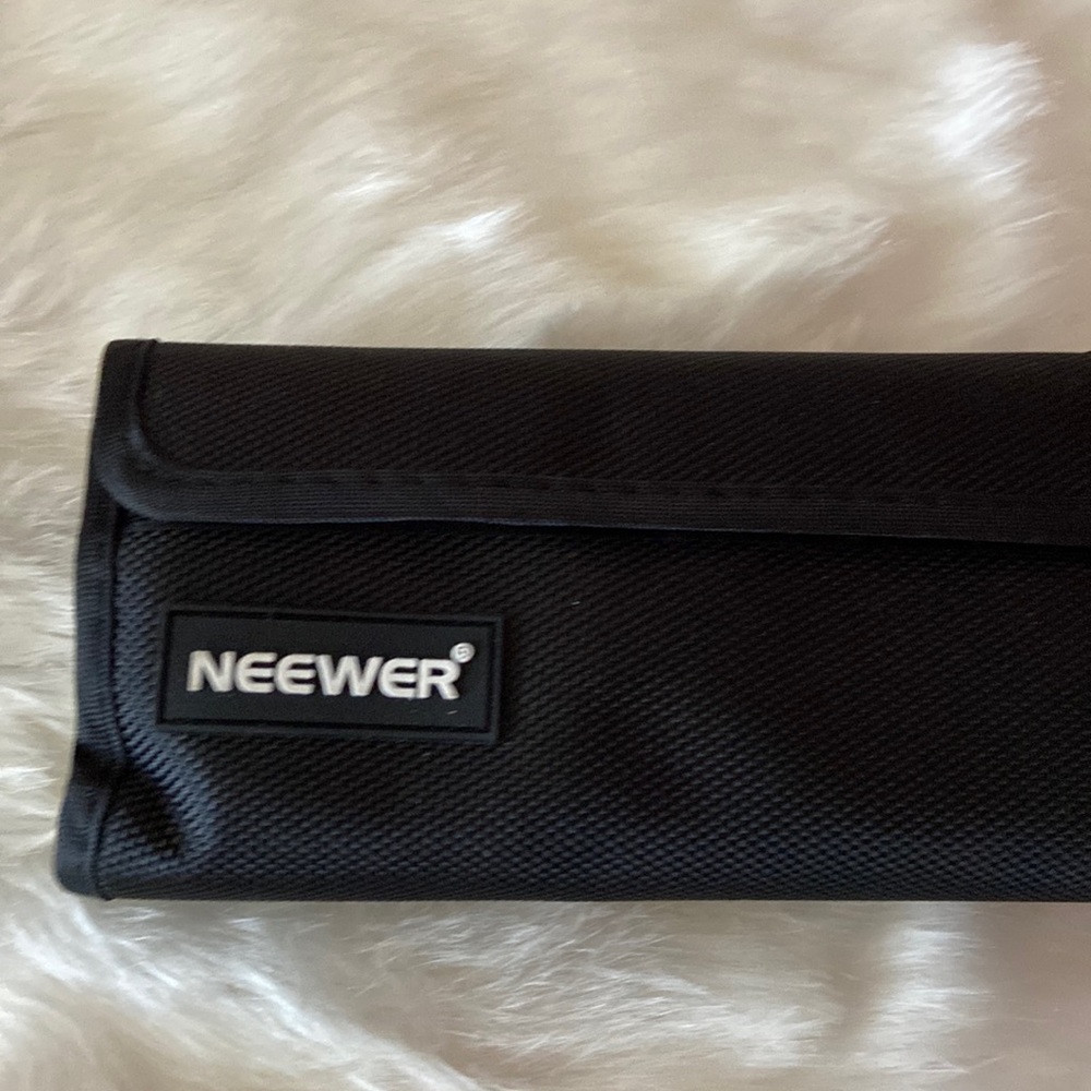 Neewer camera lens covers.